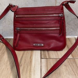 Nine West brand red leather crossbody bag.